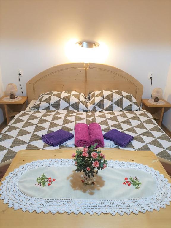 Postel nebo postele na pokoji v ubytování Apartment Sonce