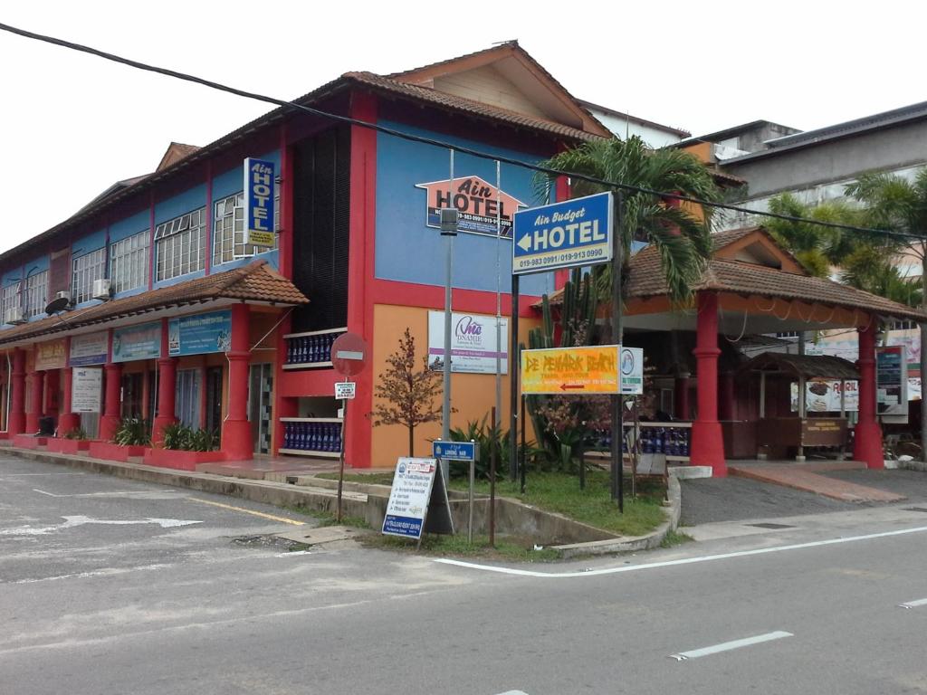 a building on the side of a street at KUALA BESUT JETTY BUDGET HOTEL AIN - In front of Kuala Besut Jetty in Kuala Besut