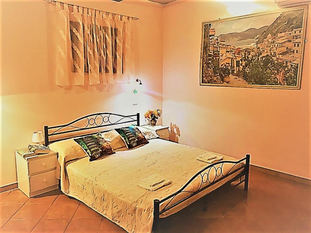 Łóżko lub łóżka w pokoju w obiekcie B&B Teodora