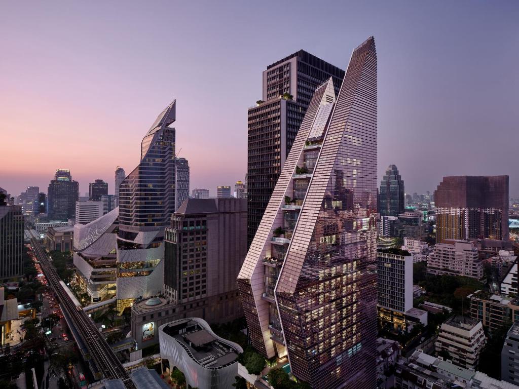 a group of tall buildings in a city at Rosewood Bangkok in Bangkok