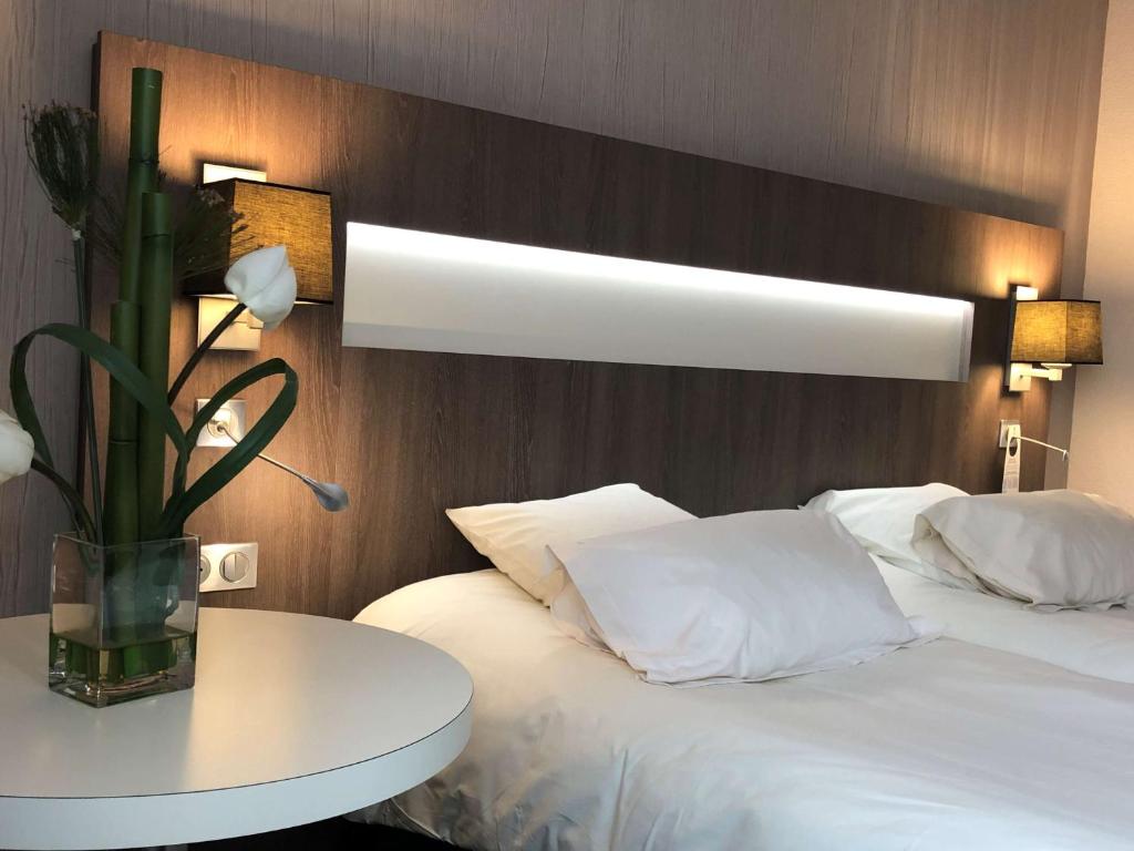Postel nebo postele na pokoji v ubytování Best Western Marseille Aeroport