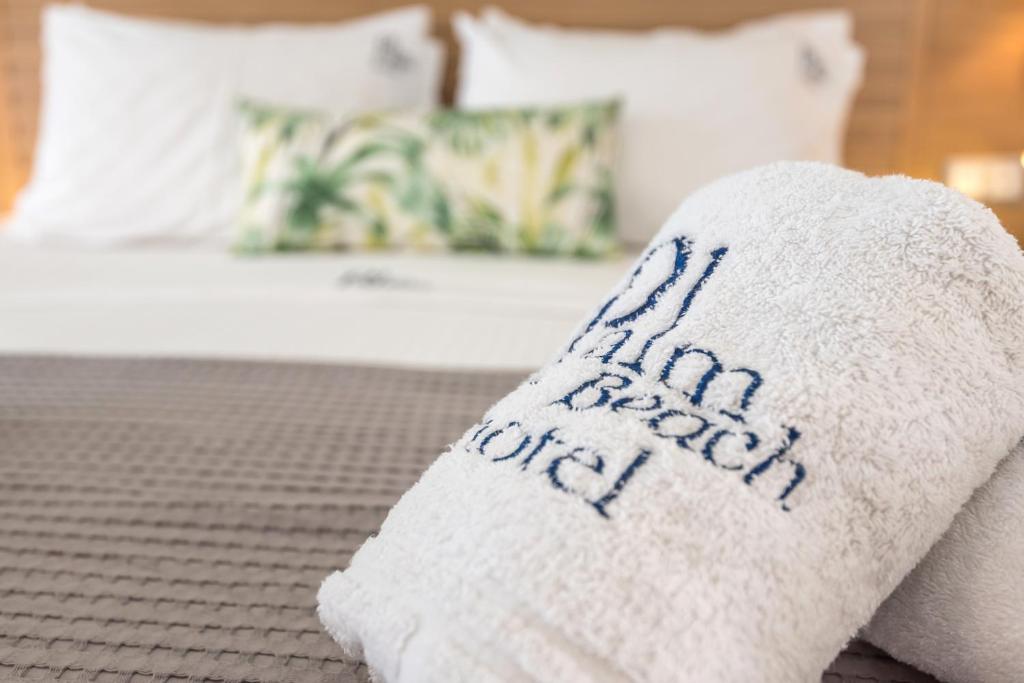 Postel nebo postele na pokoji v ubytování Palm Beach Hotel - Adults only