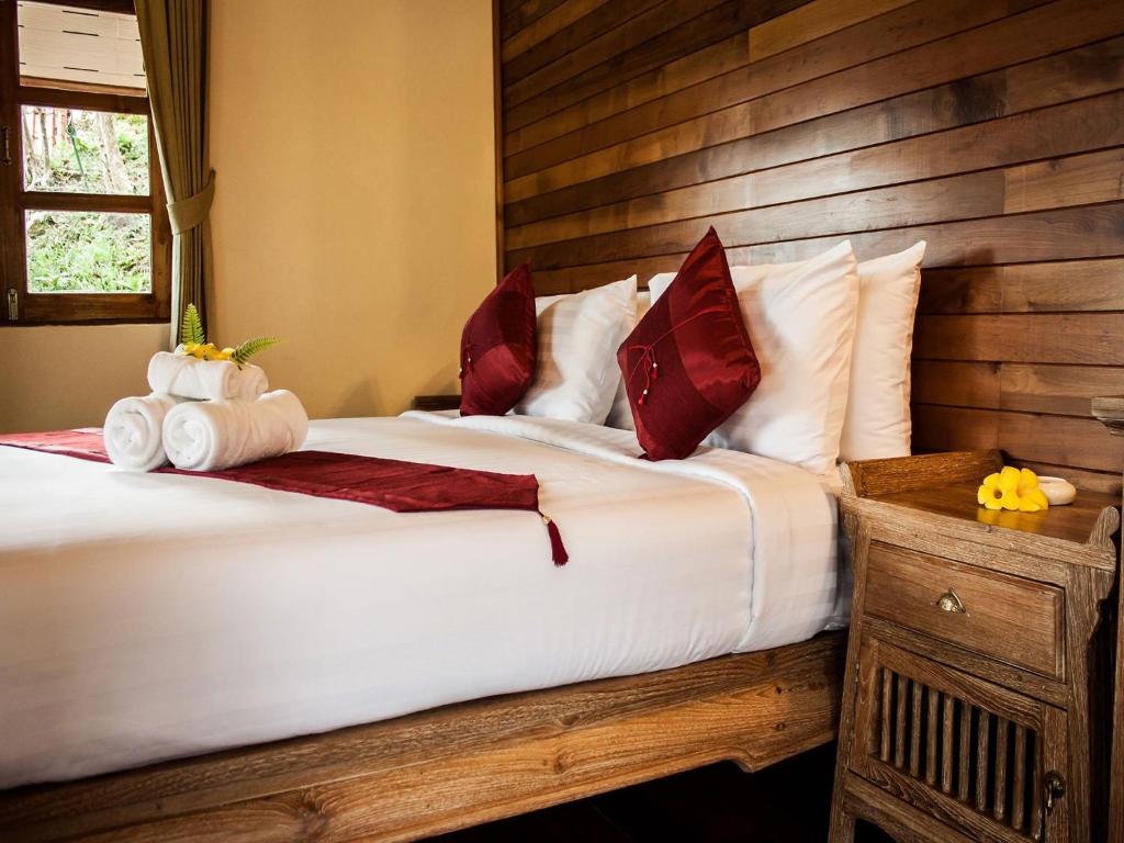 Кровать или кровати в номере Chaipura Resort