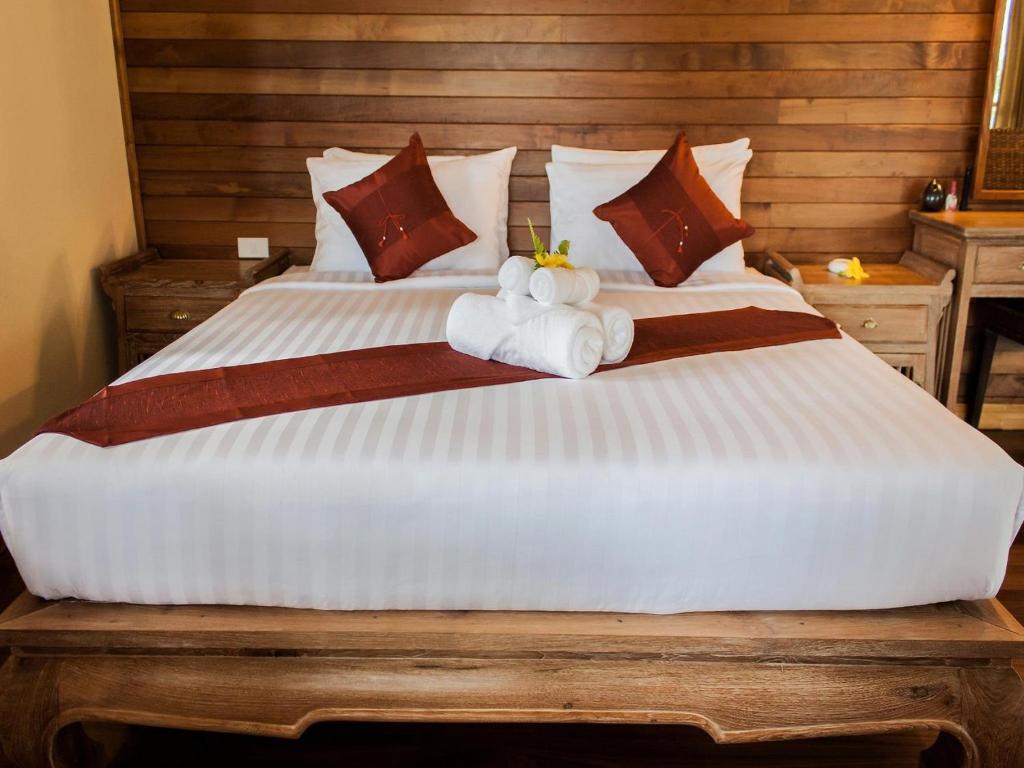 Кровать или кровати в номере Chaipura Resort
