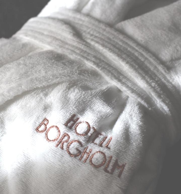 Postel nebo postele na pokoji v ubytování Hotell Borgholm