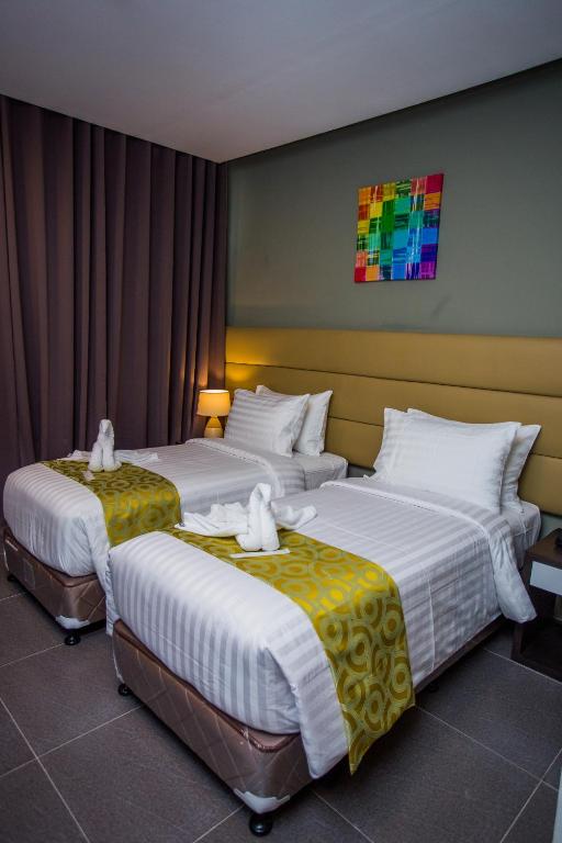 Postel nebo postele na pokoji v ubytování Hotel Costa Brava