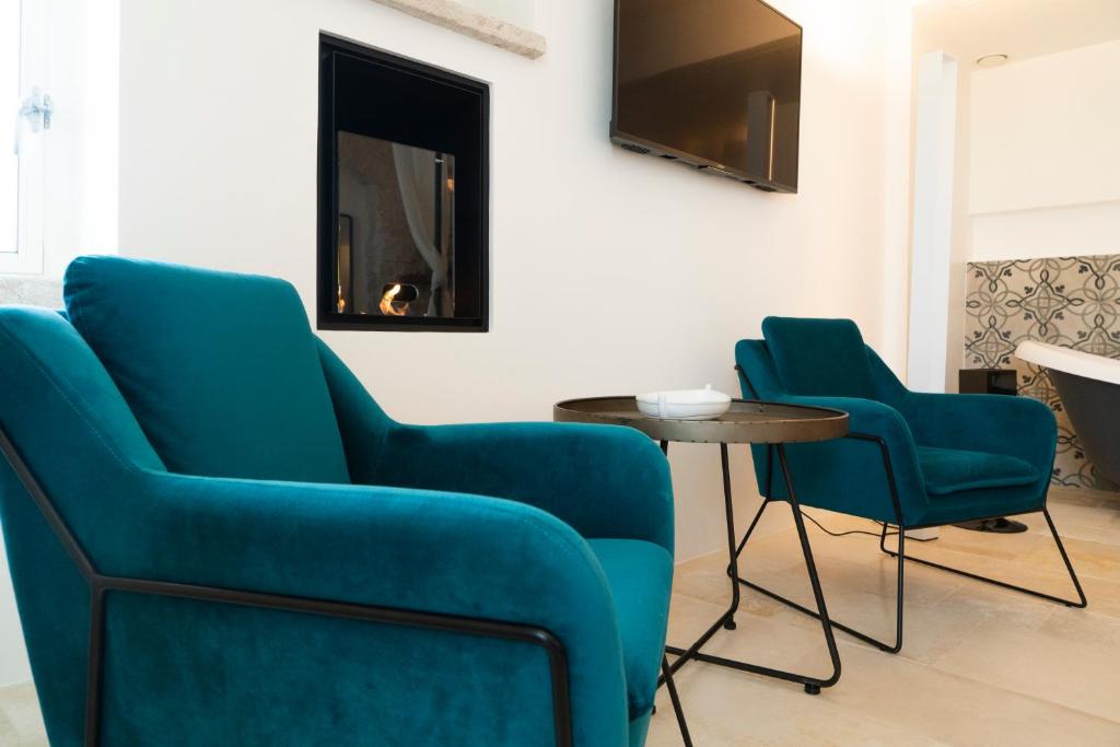 Posezení v ubytování Antico Mondo Rooms & Suites