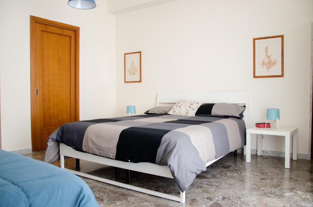 Postel nebo postele na pokoji v ubytování Casa Gentile Carducci
