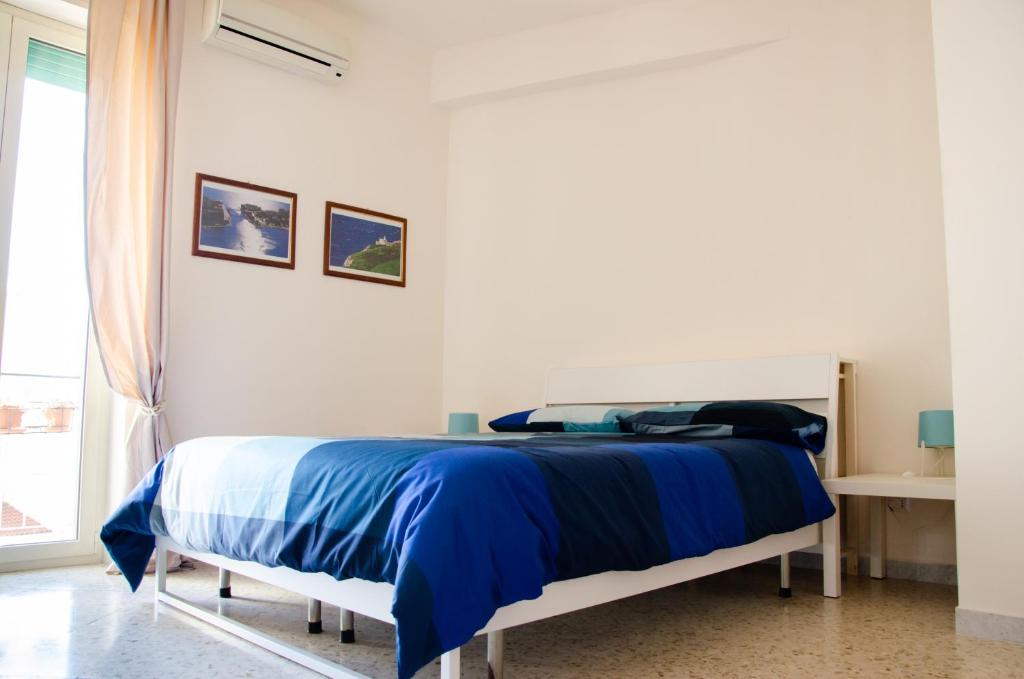 Postel nebo postele na pokoji v ubytování Casa Gentile Carducci