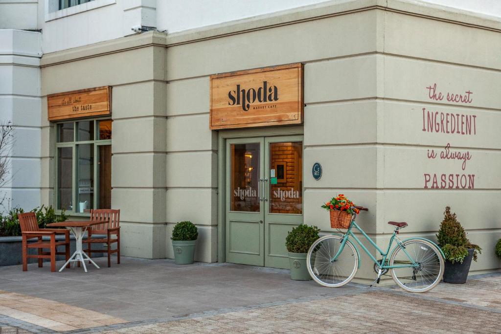 a bike parked in front of a restaurant at Glenroyal Hotel in Maynooth