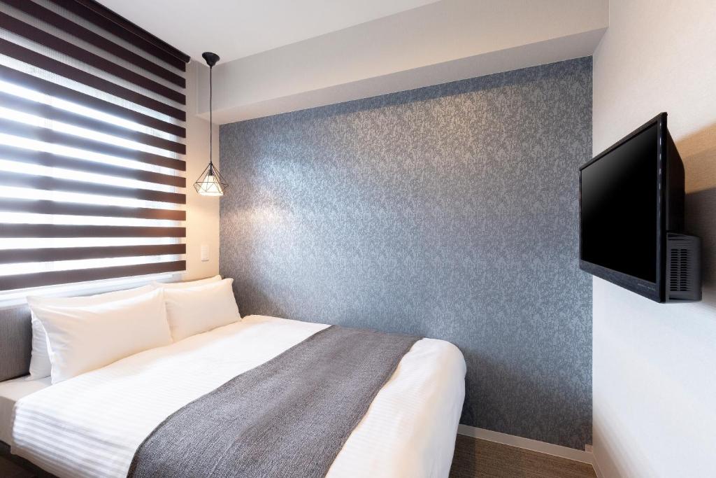 TV a/nebo společenská místnost v ubytování M's Hotel Gojo Naginatagiri