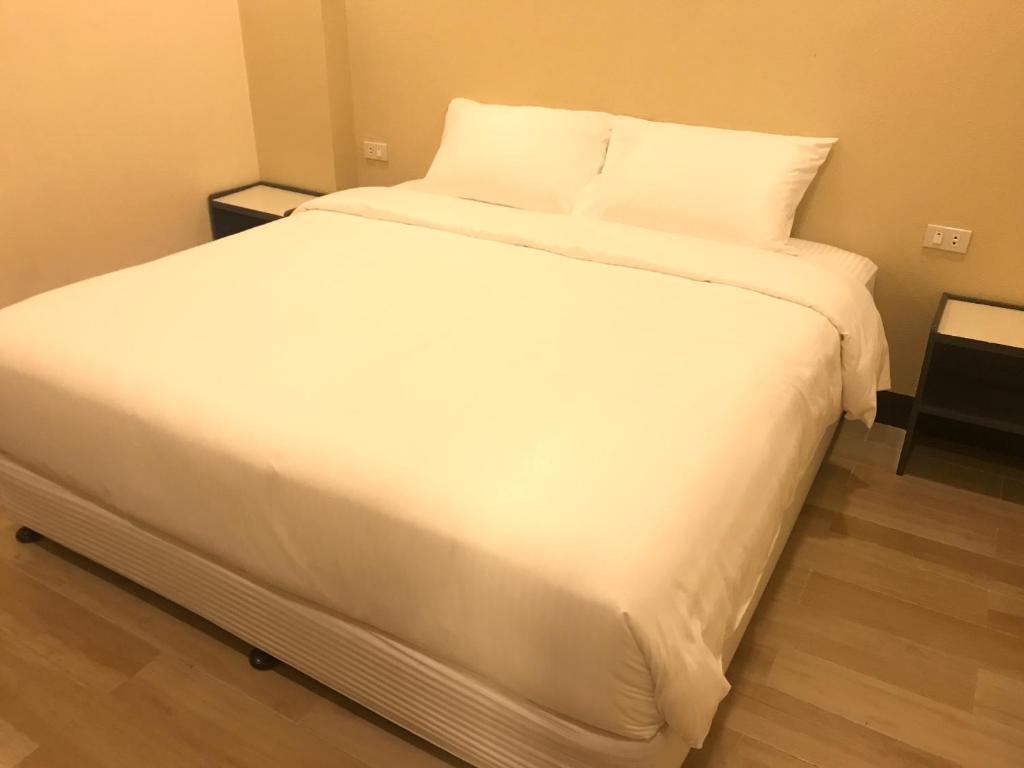 Postel nebo postele na pokoji v ubytování Babylon Oslob Coast Guesthouse