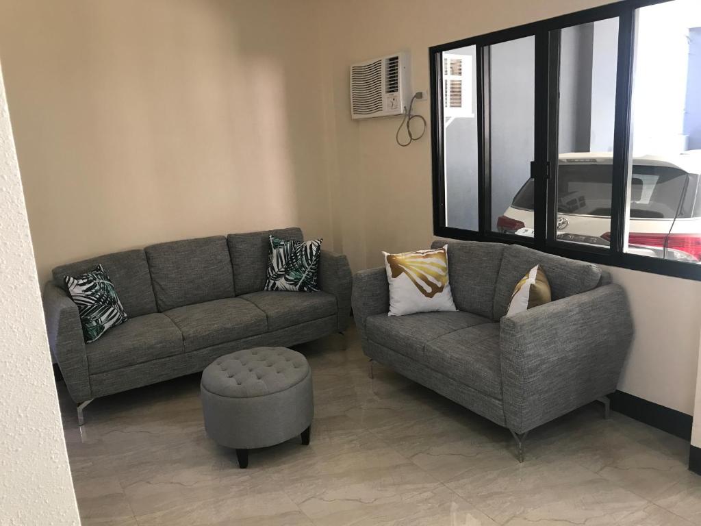 Posezení v ubytování Babylon Oslob Coast Guesthouse