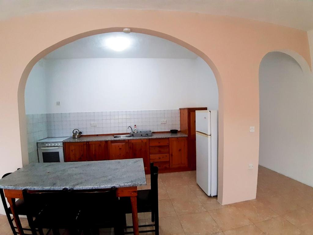 Kuchyň nebo kuchyňský kout v ubytování Cesca Apartments - Marsalforn, GOZO