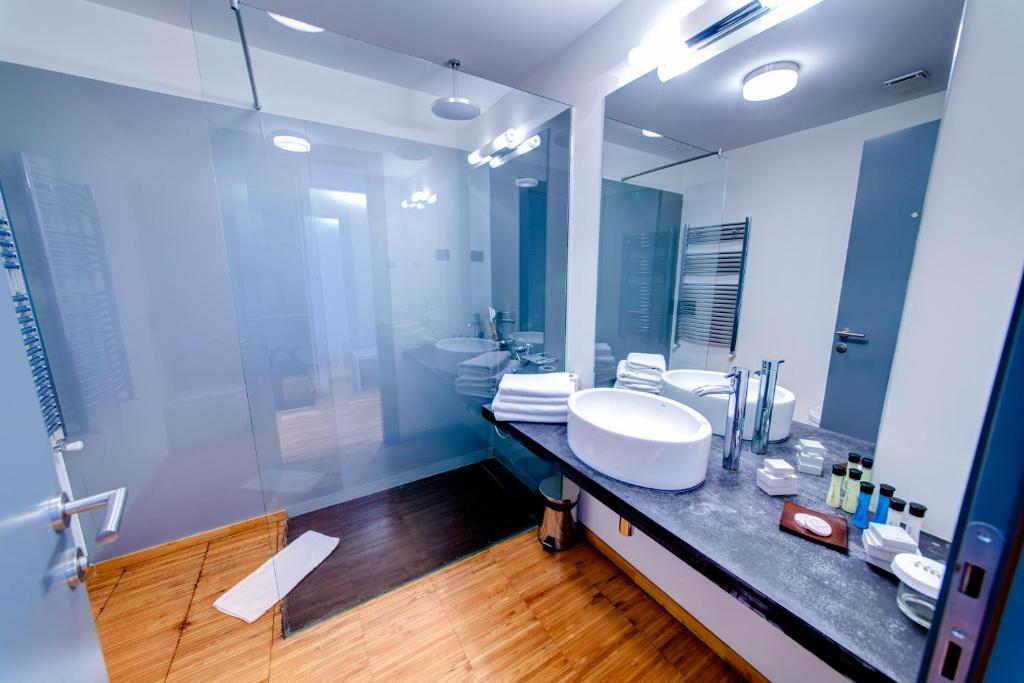 Koupelna v ubytování Sarroglia Hotel