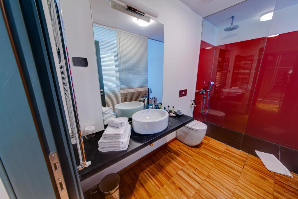 Koupelna v ubytování Sarroglia Hotel
