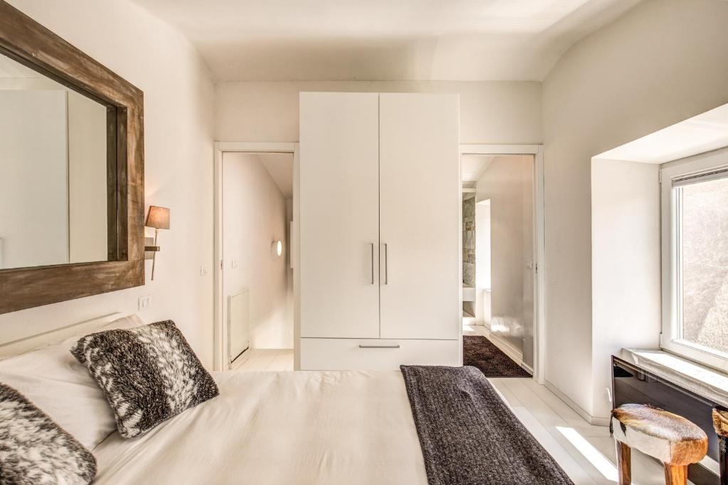 Posteľ alebo postele v izbe v ubytovaní Appartamento di design con vista sui monti