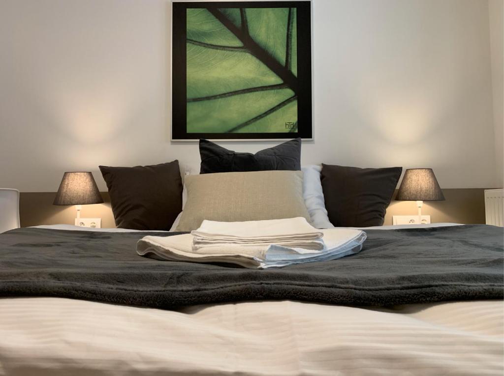 Łóżko lub łóżka w pokoju w obiekcie AP 1 - Apartments 4U Březinova "Overnight Simply"