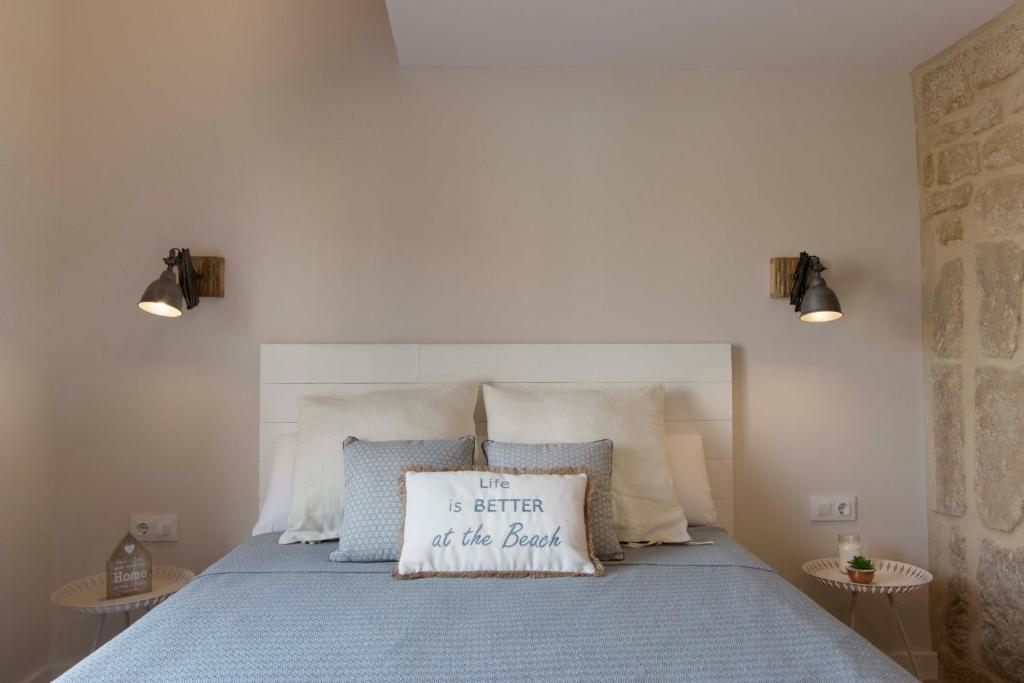 A bed or beds in a room at El Mirador de Eloísa