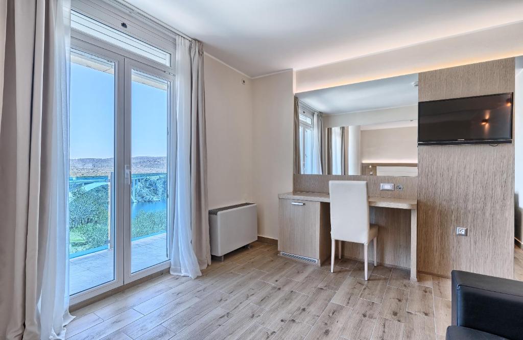 TV a/nebo společenská místnost v ubytování Hotel Panorama