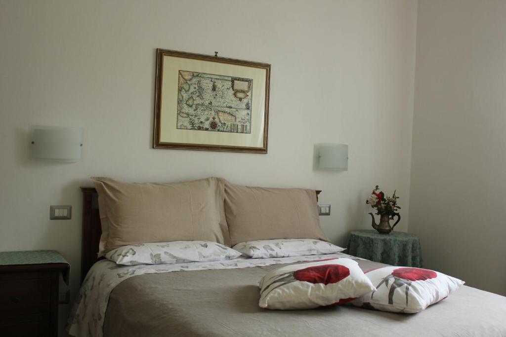Postel nebo postele na pokoji v ubytování B&B Il Giardino Di Isa