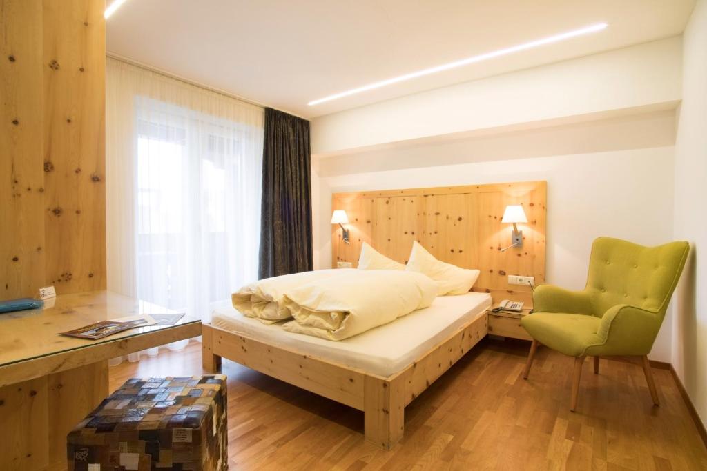 Postel nebo postele na pokoji v ubytování Bed&Breakfast Pension Hilpold