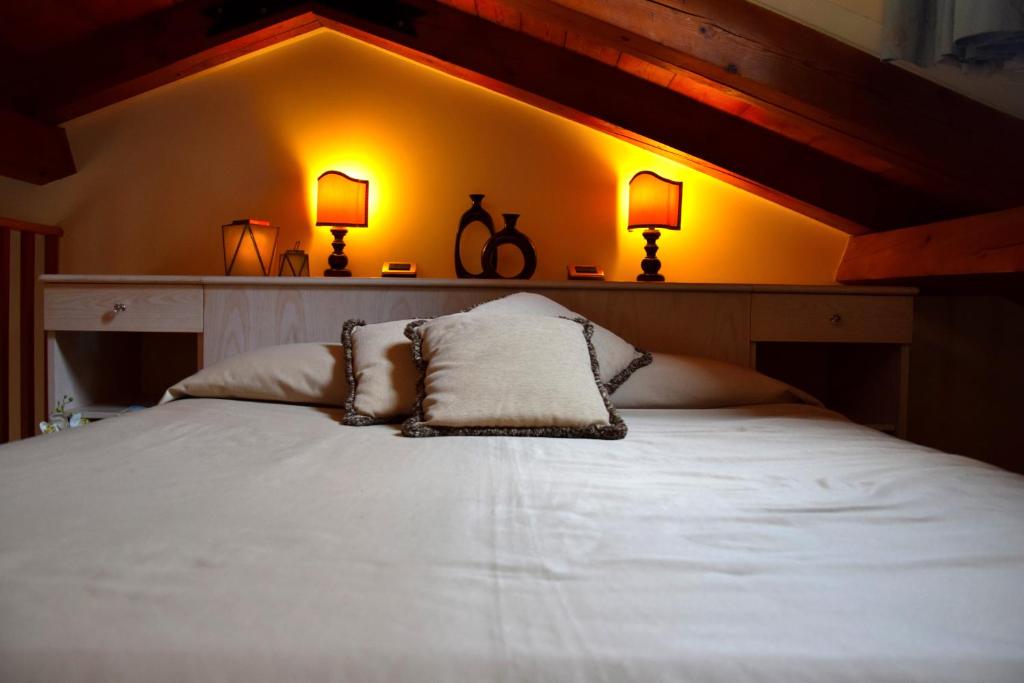 A bed or beds in a room at Residenza Favaro