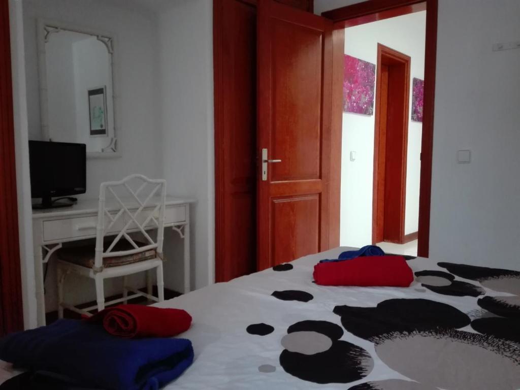 A bed or beds in a room at Bungalow Mariano 140