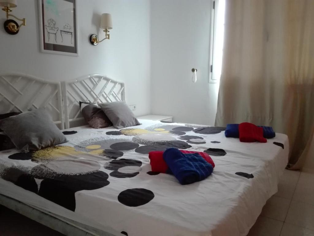 A bed or beds in a room at Bungalow Mariano 140