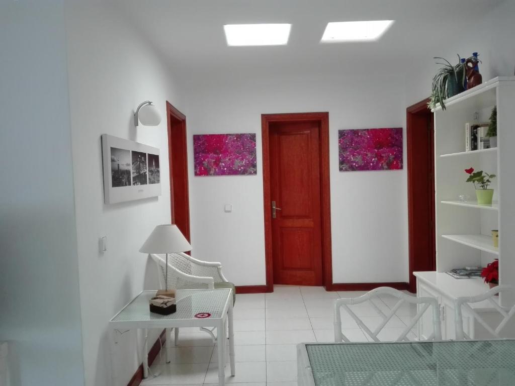 A seating area at Bungalow Mariano 140
