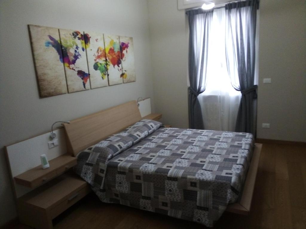 Ein Bett oder Betten in einem Zimmer der Unterkunft Cooper Apartment