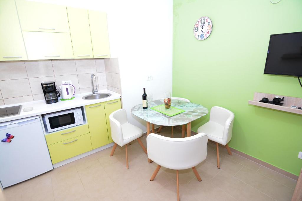 Kuchyň nebo kuchyňský kout v ubytování Holiday Home Cattaro