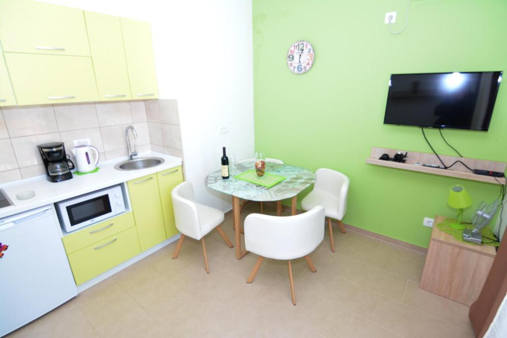 Kuchyň nebo kuchyňský kout v ubytování Holiday Home Cattaro