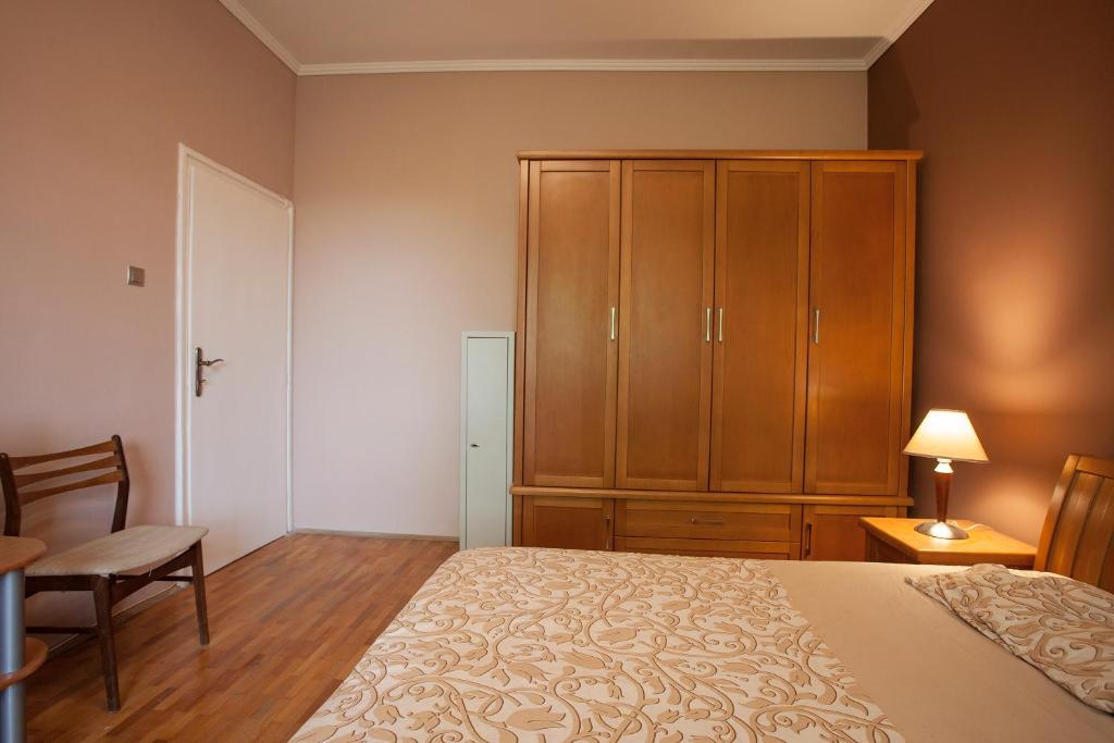 A bed or beds in a room at Perfect Apartment