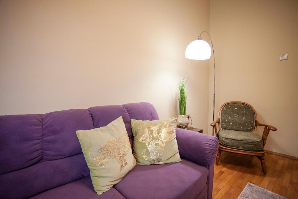 A seating area at Perfect Apartment