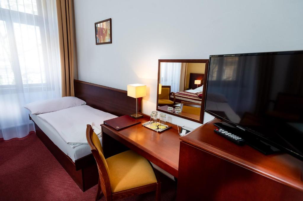 Telewizja i/lub zestaw kina domowego w obiekcie Hotel Petr