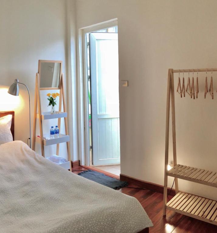 Postel nebo postele na pokoji v ubytování Khai Homestay