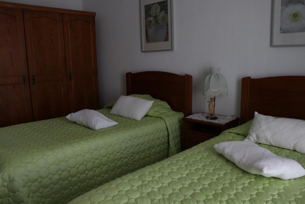 Postel nebo postele na pokoji v ubytování Casa Belmira