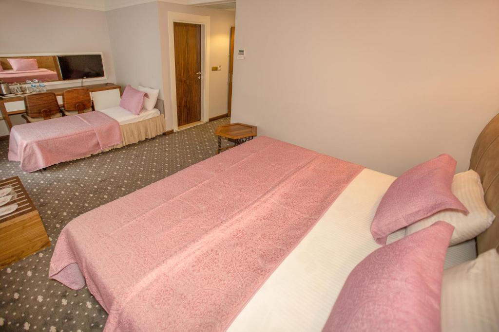 Jolnar garden hotel - Тройной комнат с видом на сад