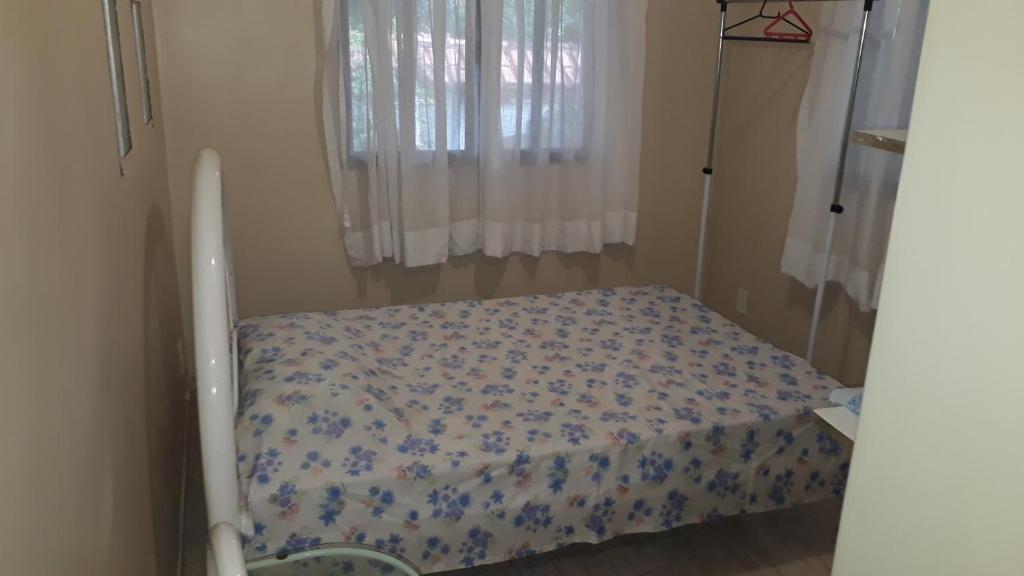 Ένα ή περισσότερα κρεβάτια σε δωμάτιο στο Casa Ribeirinha de Guapi