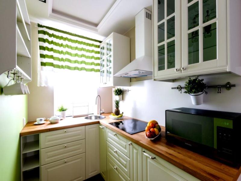 Kuchyň nebo kuchyňský kout v ubytování Nr 3 EUROPA22 Standard Apartament z wanną i balkonem PARKING 24 CENTRUM MIASTA Quick Check-in