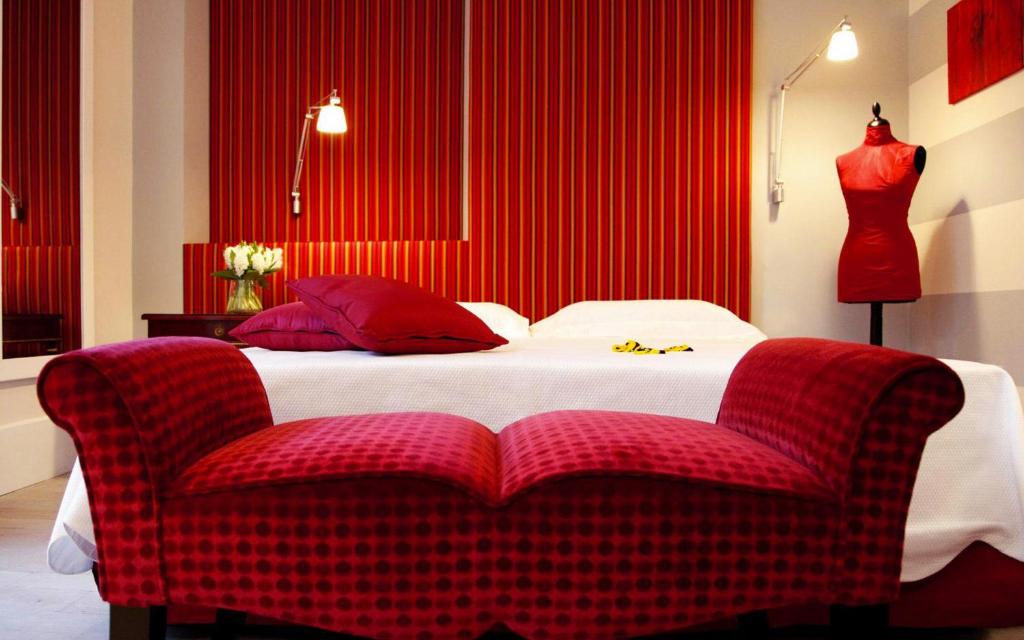 Postel nebo postele na pokoji v ubytování Hotel Arancioamaro
