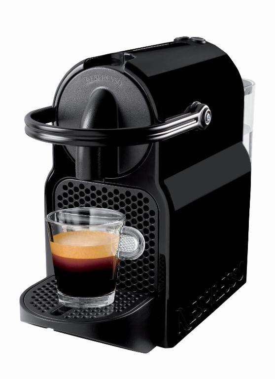 a coffee maker with a glass of coffee at Appartements résidence Roches Rouges in Tignes