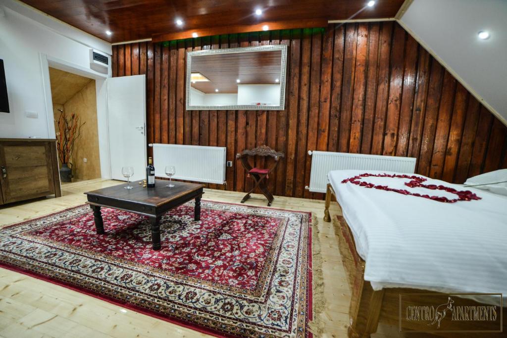 Postel nebo postele na pokoji v ubytování Centro Apartments
