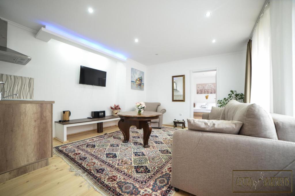 TV a/nebo společenská místnost v ubytování Centro Apartments