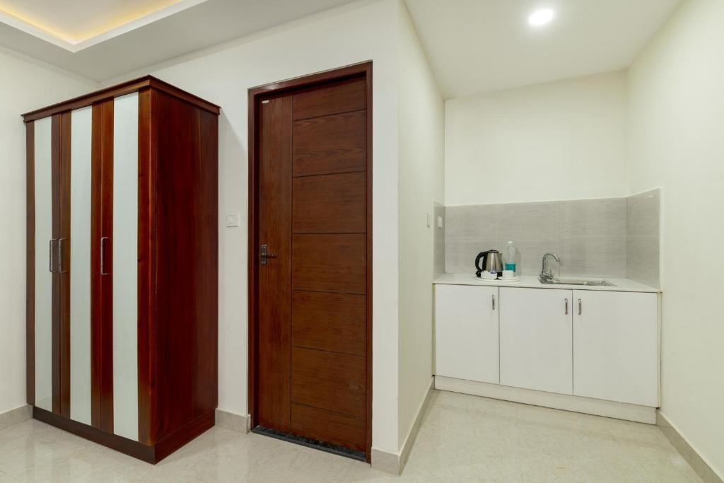 Kuchyň nebo kuchyňský kout v ubytování Burooj Hotel