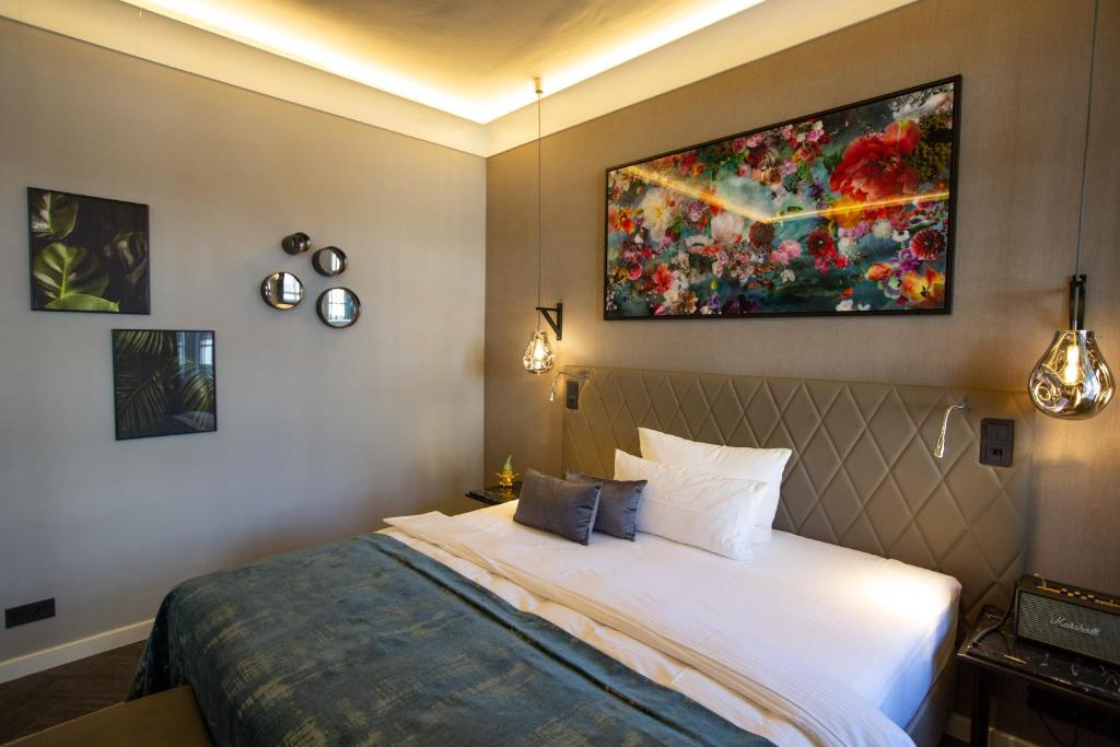Postel nebo postele na pokoji v ubytování Boutique Hotel Poppenbütteler Hof
