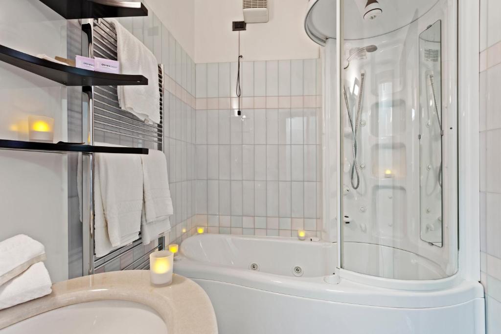 Koupelna v ubytování Hotel Olimpia