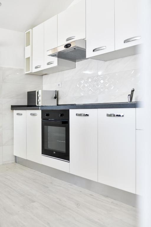 Kuchyň nebo kuchyňský kout v ubytování Apartman Novokmet-Crno