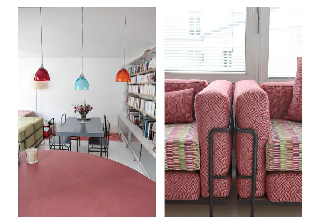 a living room with a pink couch and a table at Apartment with terrace 5 people Bastille by Weekome in Paris